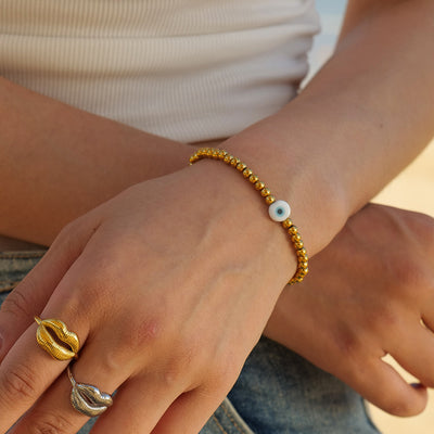 18k gold trendy personalized devil's eye bracelet with beaded design - Syble's