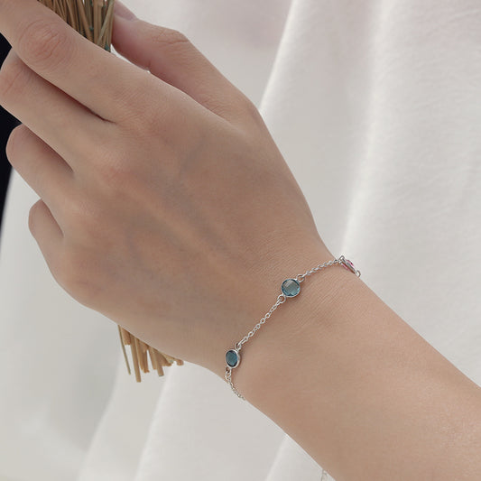 Dazzling inlaid four colored gemstone design luxury bracelet