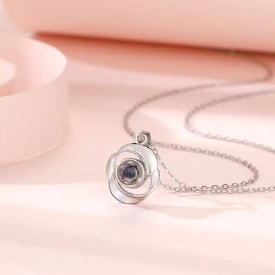 Trendy fashion rotating circular projection necklace - Syble's