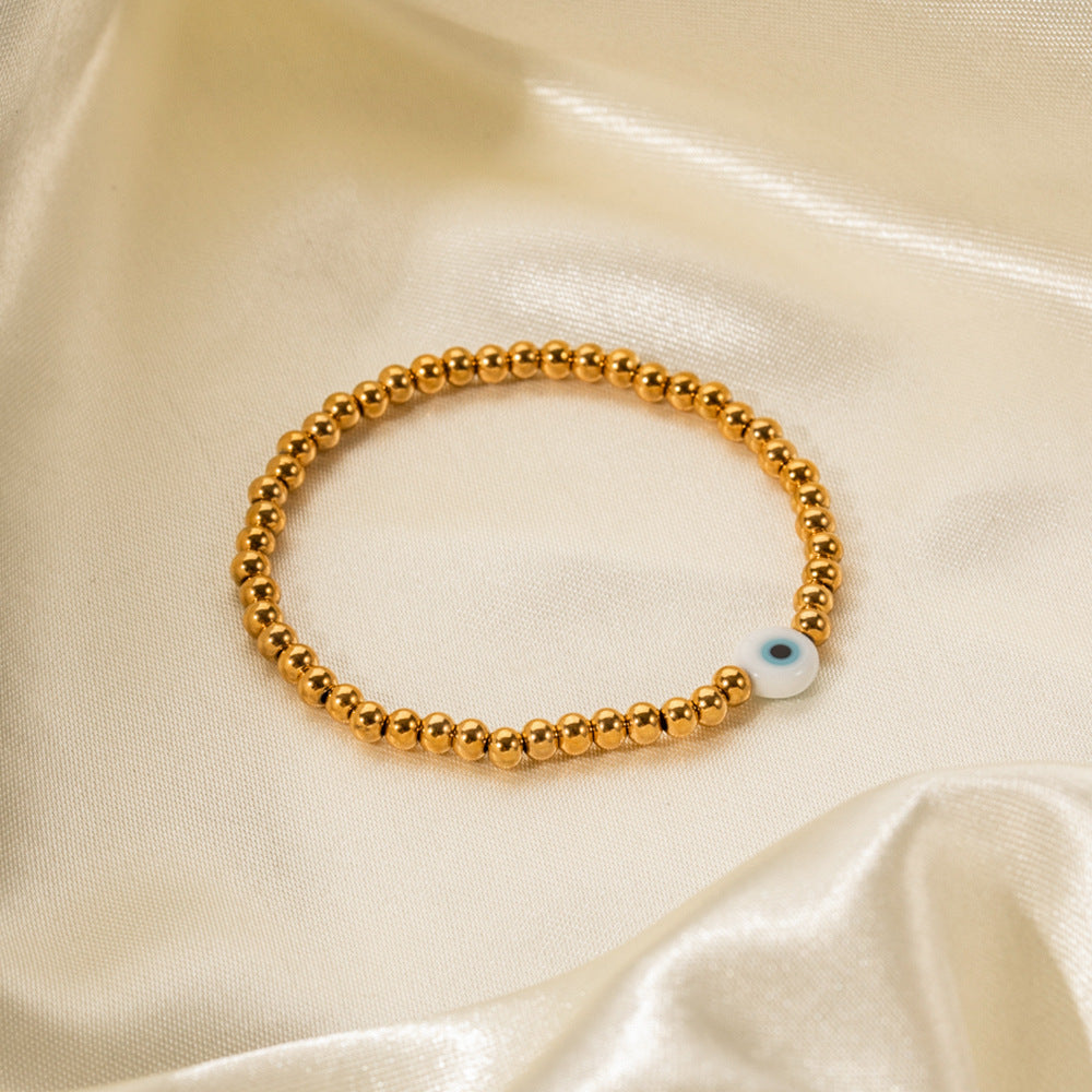 18k gold trendy personalized devil's eye bracelet with beaded design - Syble's