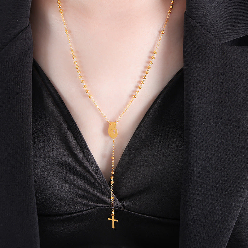 18K gold fashionable woman portrait with cross tassel design versatile necklace - Syble's