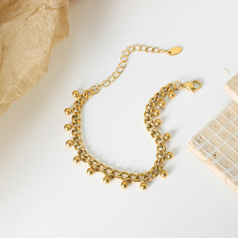 18K gold noble light luxury round beads with tassel design bracelet