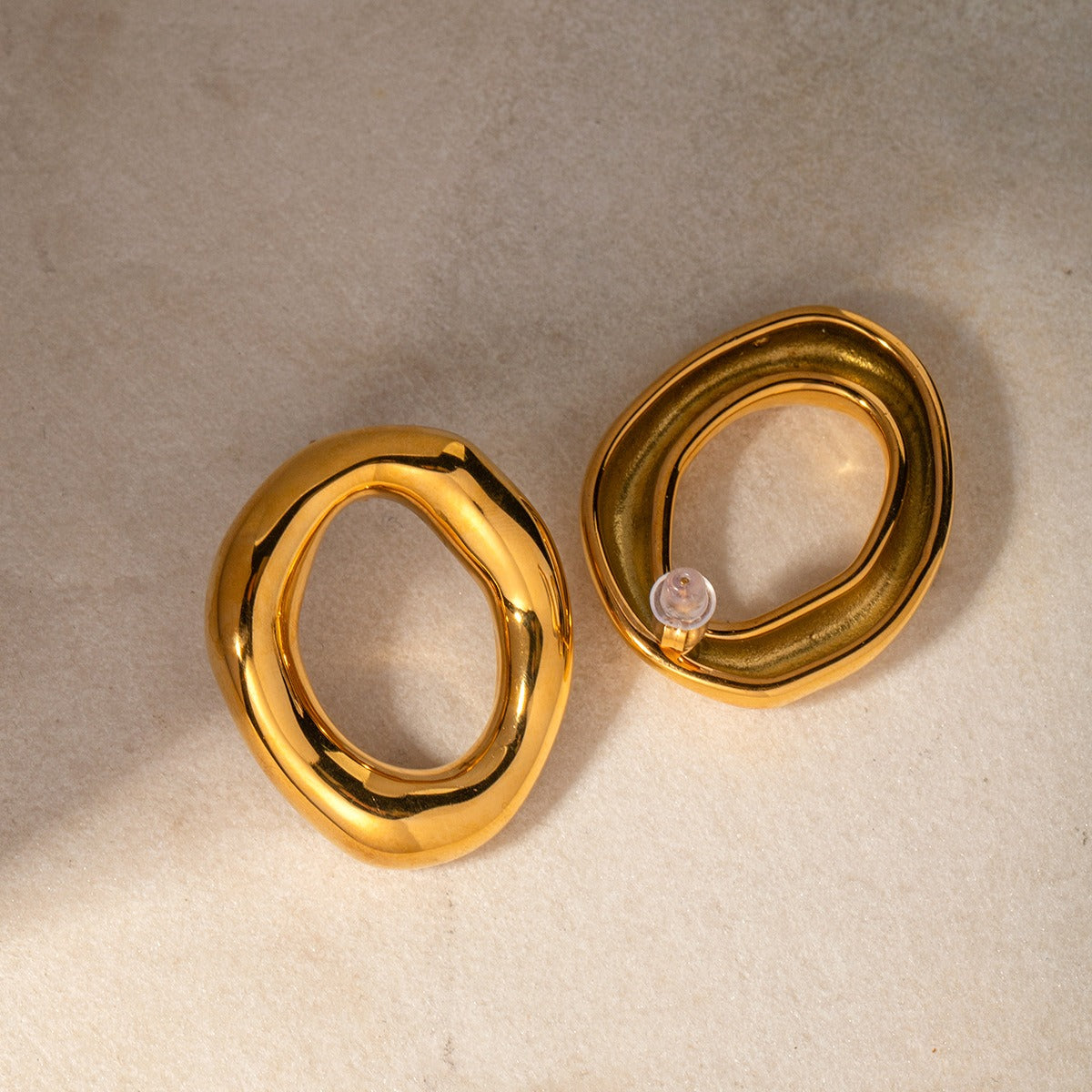 Gold simple and elegant oval hollow design versatile earrings