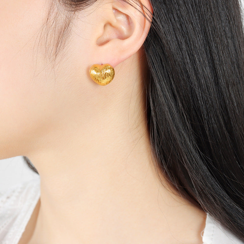 18K gold retro fashion heart-shaped earrings with embossed design and light luxury style